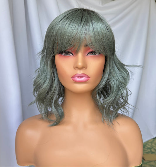 Rene of Paris Breezy Wavez Smoky Forest wig with bangs