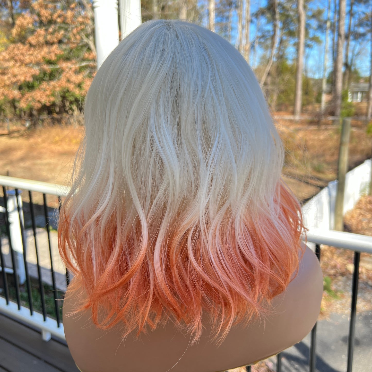 CREME SODA - Platinum White and Orange synthetic wig with bangs