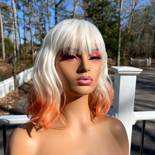 CREME SODA - Platinum White and Orange synthetic wig with bangs