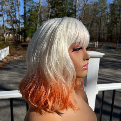 CREME SODA - Platinum White and Orange synthetic wig with bangs